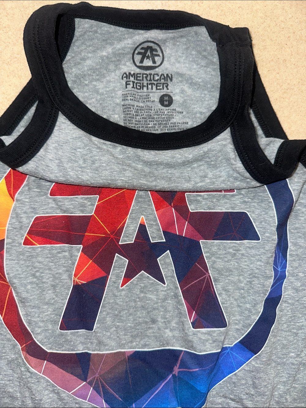 American Fighter Women’s Gray Tank with Multicolor Geometric Logo and Black Trim